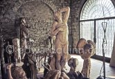 A view of the sculpture studio on the ground floor of Mas Notre-Dame-de-Vie. Amid Pablo Picasso's own sculptures, a plaster copy of Michelangelo's "Dying Slave". At right, "Head of a Woman", Boisgeloup, 1932. Mas Notre-Dame-de-Vie, Mougins 7/1974. (postumous). - Photo by Edward Quinn