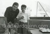 Edward Quinn and Alexander Onassis on board Onassis' Yacht Christina. Monaco harbor 1957. - Photo by Edward Quinn