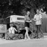 Edward and Gret Quinn in good mood after waiting two days for a mechanic who was able to repair their Mathis 1931/32 Type PYC in a village near Arles. Summer 1951. - Photo by Edward Quinn