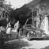 Car enthusiast Prince Rainier of Monaco at his Villa Iberia. He competed under the pseudonym of Louis Carladès at the Tour de France de l'automobile and crashed into a tree. Saint-Jean-Cap-Ferrat 1954. Car: Lancia Aurelia B20 Gran Turismo 2500 - Photo by Edward Quinn