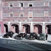 The cars and chauffeurs of Prince Rainier in the court of the Palace. Monaco-Ville 1954. From left:1953 Ford Vedette (Mr. Louche), 1950 Lincoln Cosmopolitan (Mr.Benoit), Mercedes-Benz 300 Limousine (Mr. Raimondo) and Lancia Aurelia B10 Berlina or B21 (RHD) (Mr. Pogliano). - Photo by Edward Quinn