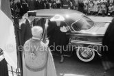 US Independence Day, church service. Princess Grace of Monaco and Reverend Father Francis Canon Tucker. Monte Carlo 1956. (Grace Kelly) Car: Imperial (Chrysler) 4-Door-Sedan 1956. 5.4L, 280PS,104mph, 4832$, High Fidelity disc player, Transistor Radio, Push-button shifting - Photo by Edward Quinn