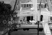 Princess Grace on board cargo ship Costa del Sol, which replaced yacht Deo Juvante II, later converted for Prince Rainier into luxury boat Deo Juvante III. Anchored in Monaco harbor 1959. - Photo by Edward Quinn