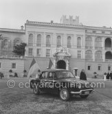 Celebrating the birth of Princess Caroline in front of the Palais. Monaco-Ville 1957. Car: Renault Dauphine - Photo by Edward Quinn