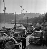 Arrival of participants, entrance to the parc fermée. N° 328 Lahaye / Quatresous on Renault 4 CV; N° 311 Lieb / Lieb on Ford; behind N° 311 Hotchkiss.  Rallye Monte Carlo 1951. - Photo by Edward Quinn