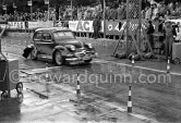 Dyna Panhard, slightly damaged, undergoing the breaking and starting test. Cars will have to accelerate as fast as possible for 200 metres from a standing start, and then pull up in the shortest possible distance, for the cars have to keep a line between the axles. Rallye Monte Carlo 1951. - Photo by Edward Quinn