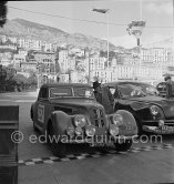 N°. 297 Nunes dos Santos / Bastos on BMW 327 Roadster and N° 187 Barendregt / Beekman on Kaiser taking part in the regularity speed test on the circuit of the Monaco Grand Prix. Rallye Monte Carlo 1951. - Photo by Edward Quinn
