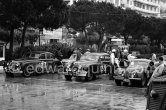 N° 123 Ronald Adams / Ernest Mc Millen on Jaguar MK VII, N° 135 J.Boardman / J. Duckworth on Jaguar MK VII, N° 212 Donald Delling / J.B. Lavell on Jaguar XK 120 taking part in the regularity speed test on the circuit of the Monaco Grand Prix. Rallye Monte Carlo 1955. - Photo by Edward Quinn