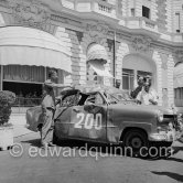 Damaged N° 200, Ford Taunus 12M.16. Rally International des Alpes 1954. In front of Carlton Hotel, Cannes 1954. - Photo by Edward Quinn