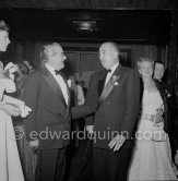 Pierre Rey (left), president of the casinos Monte Carlo and financial advisor of Prince Rainier and Prince Hussein Pacha. "Bal de la Rose" gala dinner at the International Sporting Club in Monte Carlo, 1954. - Photo by Edward Quinn