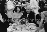 Myriam Bru and Angelo Rizzoli, Italian Film Producer. Cannes Film Festival 1956. - Photo by Edward Quinn