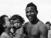 Sugar Ray Robinson, American professional boxer. Frequently cited as the greatest boxer of all time. Juan-les-Pins 1951. - Photo by Edward Quinn