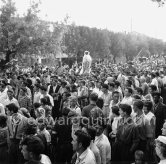 The statue of Sara, Patron Saint of the Gypsies. Gypsies on the occasion of the yearly pilgrimage and festival of the Gypsies in honor of Saint Sara, Saintes-Maries-de-la-Mer in 1953. - Photo by Edward Quinn