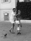 Dominican diplomat-playboy Porfirio Rubirosa with his fifth and last wife Odile Rodin, French actress and her Chihuahua Negrita at Eden Roc. Cap d’Antibes 1957. - Photo by Edward Quinn