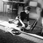 When Françoise Sagan became famous, having written "Bonjour Tristesse", she went to live at Cannes in a room at the Carlton Hotel and worked there on her novel "Un certain Sourire". Cannes 1954. - Photo by Edward Quinn