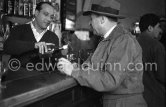 Georges Simenon at a bar in Cannes 1955. - Photo by Edward Quinn