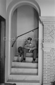 George Simenon at his Villa Golden Gate. Cannes 1955. - Photo by Edward Quinn