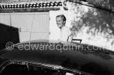 The Earl of Suffolk and his wife. Antibes 1961. Car: Aston Martin DB4. - Photo by Edward Quinn