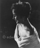 Elizabeth Taylor after the screening of "Around the World in 80 Days" at the Cannes Film Festival in 1957. She was among more than a thousand guests invited by her husband Mike Todd to a gala supper at Les Ambassadeurs to celebrate the film. At this time she was widely considered to be one of the most beautiful women in the world. - Photo by Edward Quinn