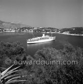 Ship and warship. Villefranche 1955. - Photo by Edward Quinn