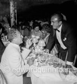 Film producer Darryl F. Zanuck, left,and Jack Warner (Warner Brothers) at Polio Gala, Sporting d'Eté. Monaco 1954 - Photo by Edward Quinn