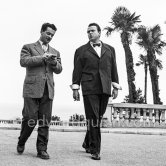 Orson Welles in front of the Casino in Monte Carlo interviewed by journalist Guy Riffet for Nice-Matin. Welles came to the Riviera to present his film "Othello" at the Cannes Film Festival. He received the "Palme d’Or" for the film. The film, at present a "classique", was vilified by most of the critics. Monte Carlo 1952. - Photo by Edward Quinn