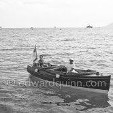 Wallis Simpson, Duchess of Windsor, coming from yacht Olnico. Villefranche harbor 1951. - Photo by Edward Quinn